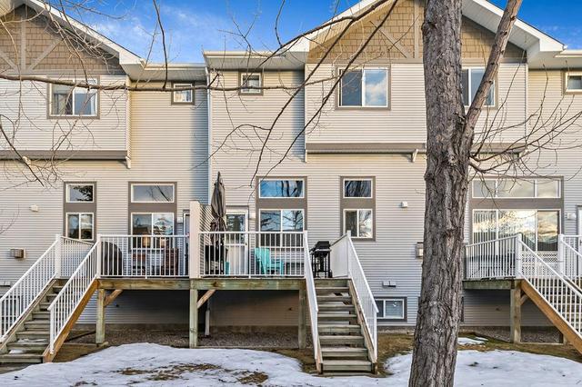12 Crystal Shores Cove, Home with 2 bedrooms, 2 bathrooms and 2 parking in Calgary AB | Image 37