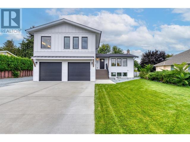 565 Sarsons Road, House detached with 4 bedrooms, 3 bathrooms and 2 parking in Kelowna BC | Image 1