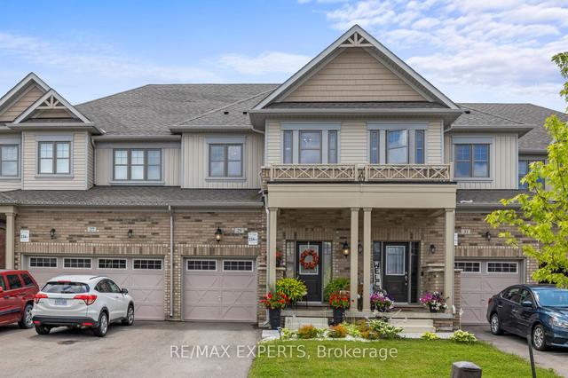 29 Arnold Cres, House attached with 3 bedrooms, 3 bathrooms and 4 parking in New Tecumseth ON | Image 1