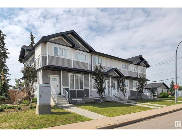 16309 100 Av Nw, House attached with 3 bedrooms, 2 bathrooms and null parking in Edmonton AB | Image 2