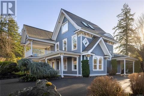 5920 Wallace Dr, House detached with 4 bedrooms, 5 bathrooms and 6 parking in Saanich BC | Card Image
