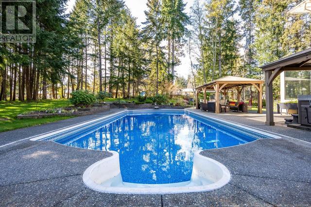 2201 Sea Lion Way, House detached with 5 bedrooms, 6 bathrooms and 7 parking in Comox Valley B (Lazo North) BC | Image 3