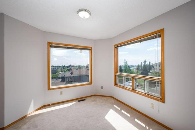2896 Signal Hill Heights Sw, House detached with 4 bedrooms, 3 bathrooms and 4 parking in Calgary AB | Image 16