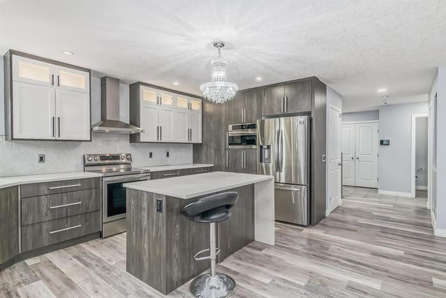 105 Hillcrest Drive Sw, House detached with 5 bedrooms, 3 bathrooms and 2 parking in Airdrie AB | Image 5