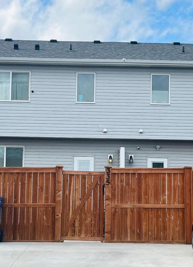 335 Mildred Dobbs Boulevard N, Home with 3 bedrooms, 2 bathrooms and 2 parking in Lethbridge AB | Image 29
