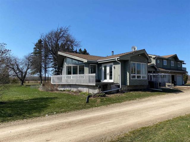 057381 8th Line, House detached with 2 bedrooms, 1 bathrooms and 10 parking in Melancthon ON | Image 1