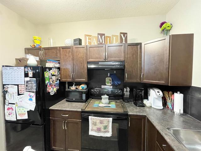 8809 94 Avenue, Home with 5 bedrooms, 2 bathrooms and 4 parking in Grande Prairie AB | Image 23