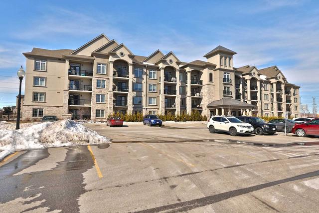 108 - 1460 Main St E, Condo with 1 bedrooms, 1 bathrooms and 1 parking in Milton ON | Image 1