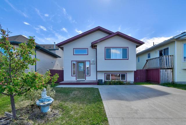 10125 98a Street, House detached with 5 bedrooms, 3 bathrooms and 3 parking in Sexsmith AB | Image 1