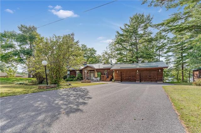 1177 Leach Lane, House detached with 4 bedrooms, 2 bathrooms and 8 parking in South Frontenac ON | Image 1