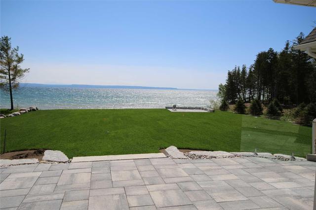 1748 Tiny Beaches Rd S, House detached with 3 bedrooms, 4 bathrooms and 10 parking in Tiny ON | Image 1