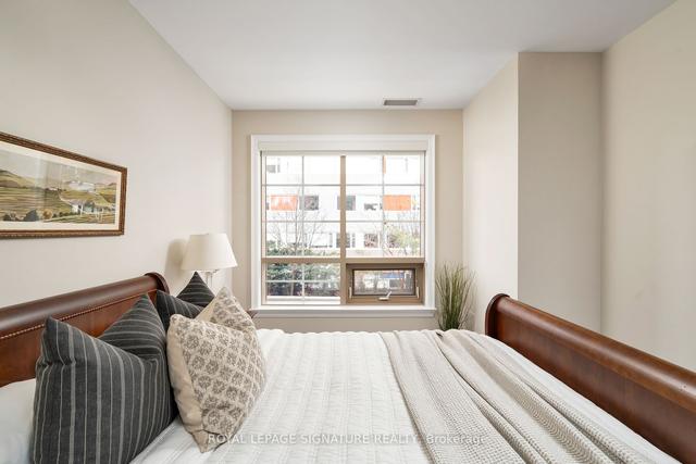 112 - 21 Burkebrook Pl, Condo with 2 bedrooms, 2 bathrooms and 1 parking in Toronto ON | Image 7