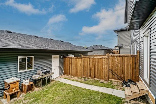 11 Belgian Lane, House attached with 3 bedrooms, 2 bathrooms and 4 parking in Cochrane AB | Image 30