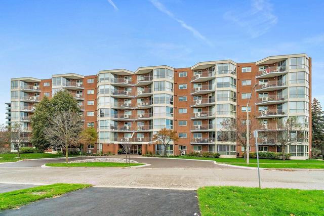 111 - 26 Hall Rd W, Condo with 1 bedrooms, 1 bathrooms and 1 parking in Halton Hills ON | Image 1