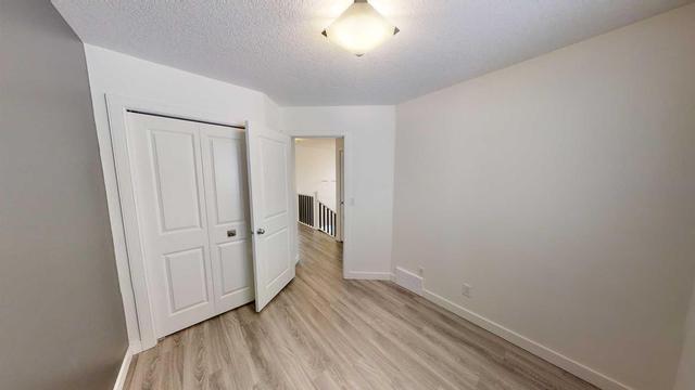 11227 75a Avenue, Home with 4 bedrooms, 3 bathrooms and null parking in Grande Prairie AB | Image 13