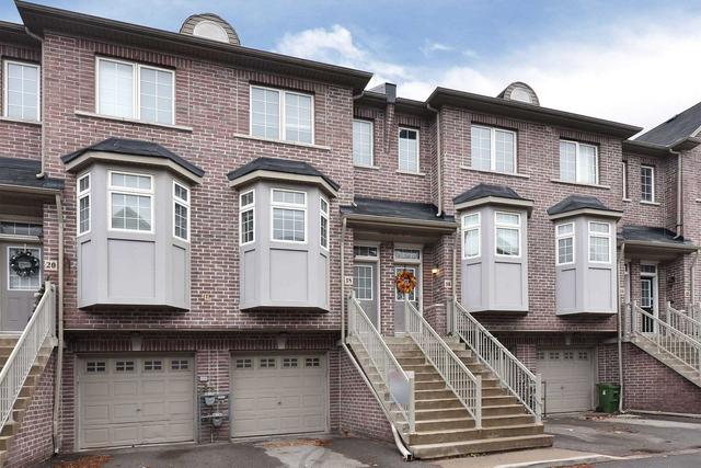 18 Piggot Mews, House attached with 3 bedrooms, 2 bathrooms and 2 parking in Toronto ON | Image 1