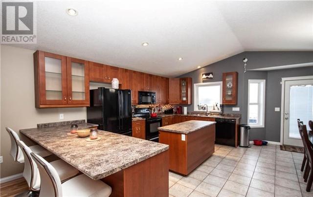 10208 93 Street, House detached with 5 bedrooms, 3 bathrooms and 4 parking in Sexsmith AB | Card Image