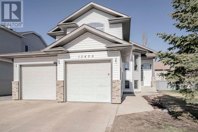12406 Crystal Lake Drive, House detached with 4 bedrooms, 3 bathrooms and 4 parking in Grande Prairie AB | Card Image