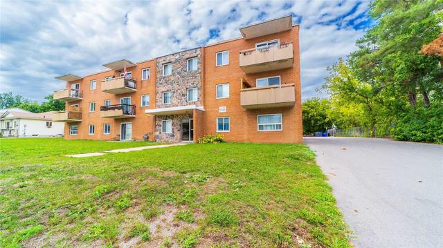 301 - 9 Princess St, Condo with 2 bedrooms, 1 bathrooms and 1 parking in Orangeville ON | Image 1