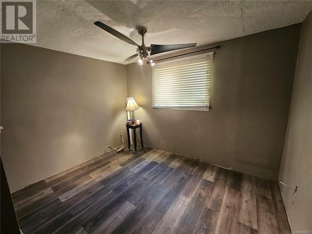 spare bedroom with new flooring | Image 31