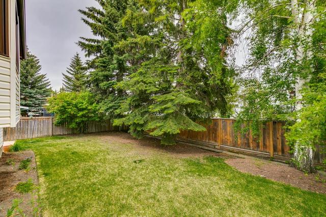 23 Woodstock Road Sw, House detached with 5 bedrooms, 3 bathrooms and 2 parking in Calgary AB | Image 47
