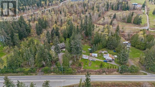 6249 Island Hwy, House detached with 3 bedrooms, 3 bathrooms and 8 parking in Comox Valley A BC | Image 23