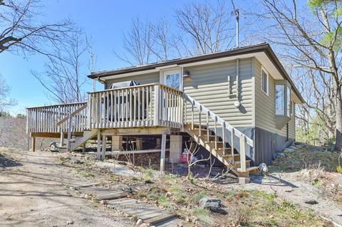 1080 Big Bay Dr W, House detached with 2 bedrooms, 1 bathrooms and 3 parking in Central Frontenac ON | Card Image