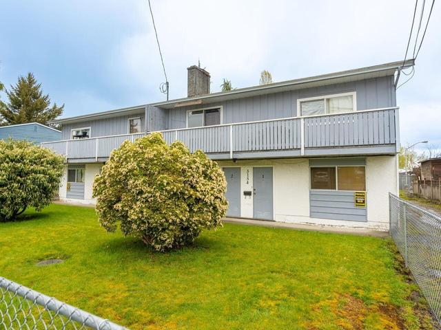 3154 - 3156 268 Street, House attached with 10 bedrooms, 4 bathrooms and 8 parking in Langley BC | Image 2