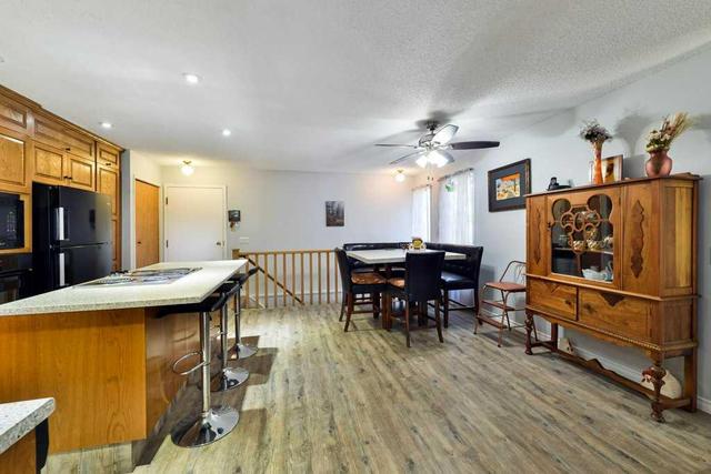18 - 185 Woodridge Drive Sw, Home with 3 bedrooms, 3 bathrooms and 4 parking in Calgary AB | Image 16