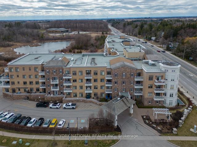 231 - 80 Burns Blvd, Condo with 2 bedrooms, 2 bathrooms and 1 parking in King ON | Image 32