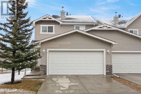62 Arbours Circle, House attached with 4 bedrooms, 3 bathrooms and 4 parking in Rocky View County AB | Card Image