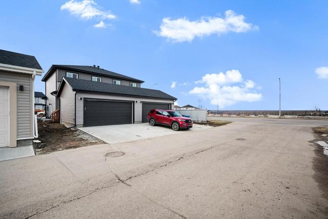 105 Clarkson Street, Home with 3 bedrooms, 2 bathrooms and 4 parking in Wood Buffalo AB | Image 22