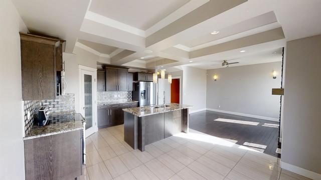 9001 80a Avenue, House detached with 5 bedrooms, 3 bathrooms and 4 parking in Grande Prairie AB | Image 2