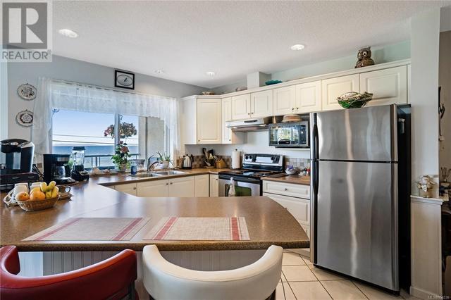 107 - 3156 Island Hwy W, Condo with 2 bedrooms, 2 bathrooms and 1 parking in Qualicum Beach BC | Image 6