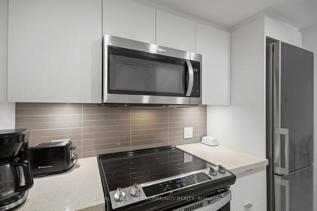 235 - 30 Tretti Way, Condo with 2 bedrooms, 2 bathrooms and 1 parking in Toronto ON | Image 25