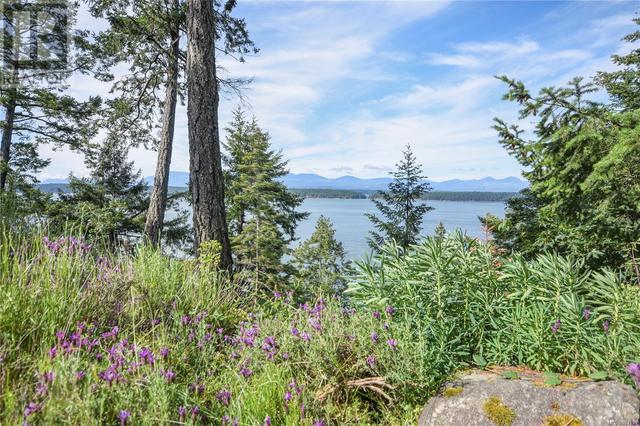 2565 Islands View Dr, House detached with 5 bedrooms, 3 bathrooms and 6 parking in Nanaimo B BC | Image 56