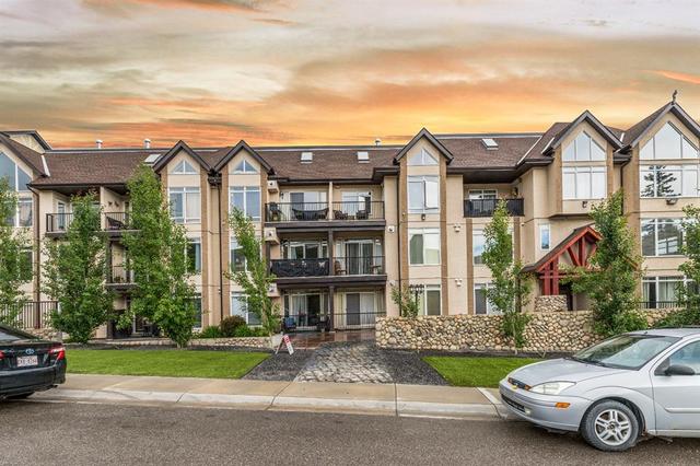 106, - 141 Mountain Street, Condo with 2 bedrooms, 2 bathrooms and 1 parking in Cochrane AB | Card Image