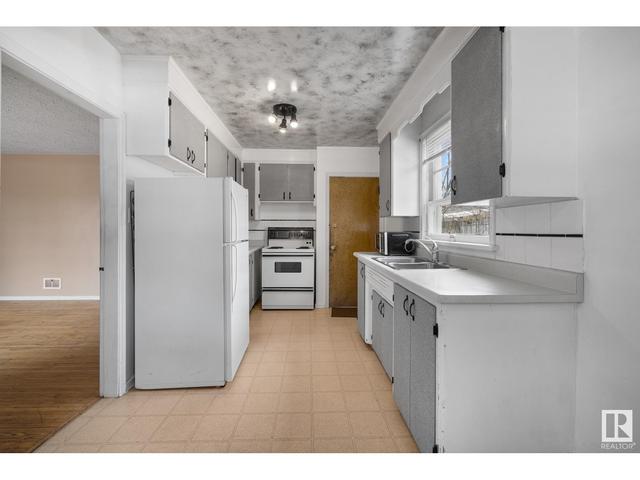11112/11116 116 St Nw Nw, House attached with 2 bedrooms, 4 bathrooms and null parking in Edmonton AB | Image 15