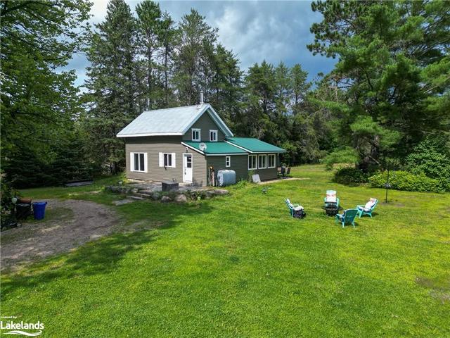 2458 Highway 118 E, House detached with 3 bedrooms, 2 bathrooms and null parking in Bracebridge ON | Image 1
