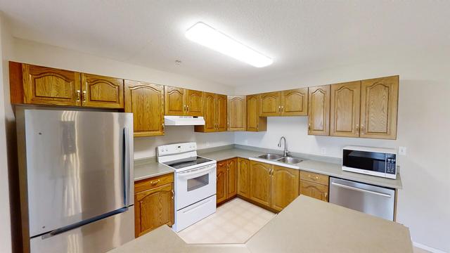 207 - 9111 104 Avenue, Condo with 2 bedrooms, 2 bathrooms and 1 parking in Grande Prairie AB | Image 10