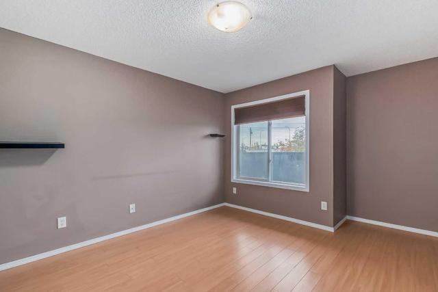 2105 - 700 Willowbrook Road Nw, Condo with 2 bedrooms, 2 bathrooms and 1 parking in Airdrie AB | Image 16