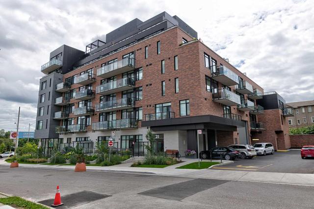 310 - 25 Malcolm Rd, Condo with 2 bedrooms, 2 bathrooms and 1 parking in Toronto ON | Image 1