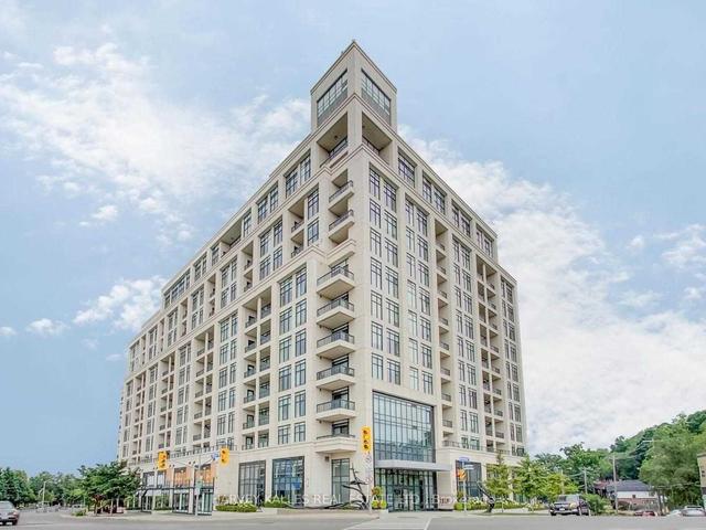 1030 - 1 Old Mill Dr, Condo with 2 bedrooms, 2 bathrooms and 1 parking in Toronto ON | Image 1