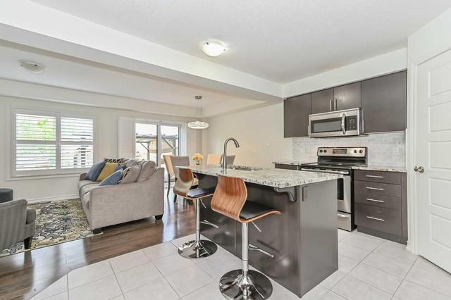 39 - 91 Poppy Dr E, Townhouse with 3 bedrooms, 3 bathrooms and 2 parking in Guelph ON | Image 6