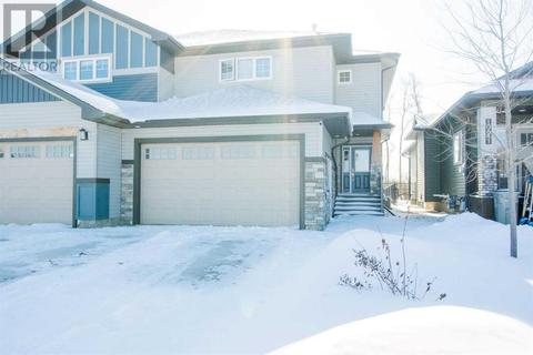 10637 66 Avenue, House semidetached with 3 bedrooms, 2 bathrooms and 4 parking in Grande Prairie AB | Card Image