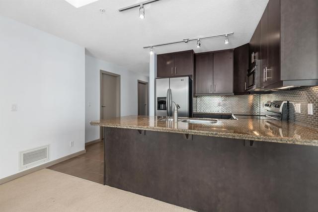 2404 - 210 15 Avenue Se, Condo with 2 bedrooms, 2 bathrooms and 1 parking in Calgary AB | Image 6