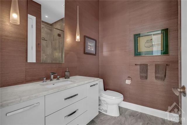 Second bathroom with a glass walk-in shower | Image 24