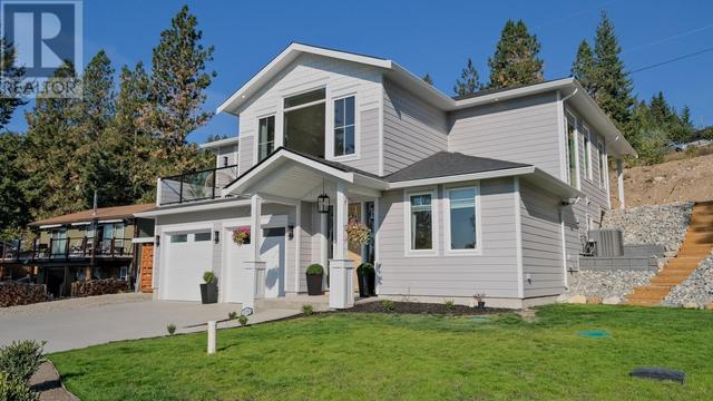 10290 Columbia Way, House detached with 4 bedrooms, 2 bathrooms and 6 parking in Central Okanagan West BC | Image 1