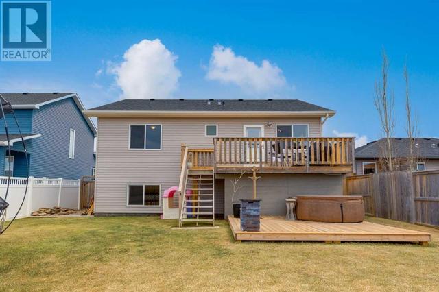 667 West Highland Crescent, House detached with 4 bedrooms, 3 bathrooms and 4 parking in Carstairs AB | Image 38