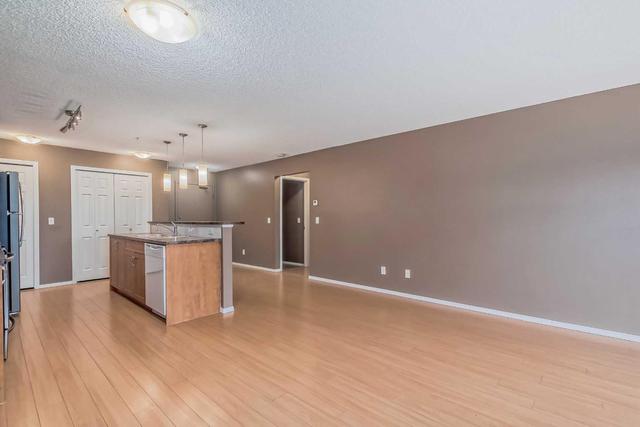 2105 - 700 Willowbrook Road Nw, Condo with 2 bedrooms, 2 bathrooms and 1 parking in Airdrie AB | Image 14